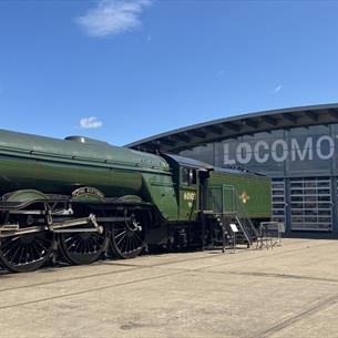 Locomotive outside of Locomotion's Collection Building