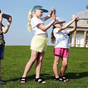 Three children at Hardwick Park using App