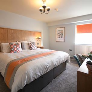 Image of a spacious room with a double bed at The Park Head Hotel.