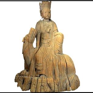 A wooden carving of the Buddhist figure of Guanyin