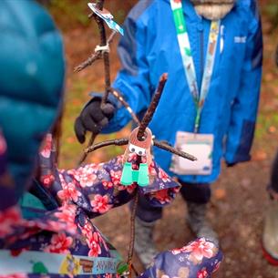 Children in Hamsterley Forest searching for stick characters on The Stickman Man Trail. Credit Forestry England Crown Copyright