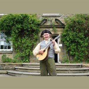 A man dressed on Folk costume at Beamish Museum.
