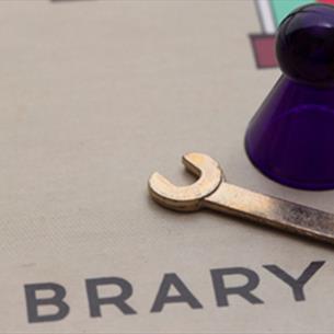 The game Cluedo. Board showing a wrench in the Library.