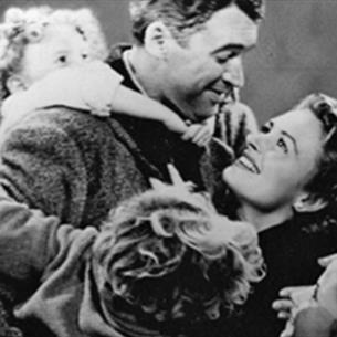 It's a Wonderful Life. Black and white poster of a couple being hugged by children.
