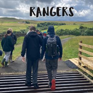 A group of children walking in the countryside