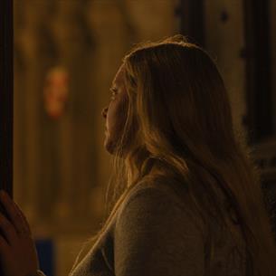 A woman peering out of one the Cathedral’s secret spaces that are rarely open to the general public.
