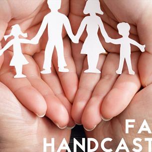 Hands together, holding a cardboard cut out family= family handcasting