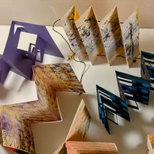 Handmade folded books in a variety of forms by artist Maggie Hickman Smith