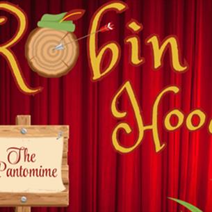 Robin Hood - The Pantomime. Background shows stage curtain.