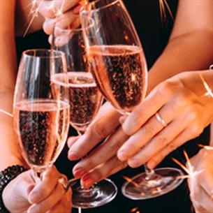 Friends toasting the new year.