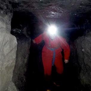 Adventurer exploring a mine.
