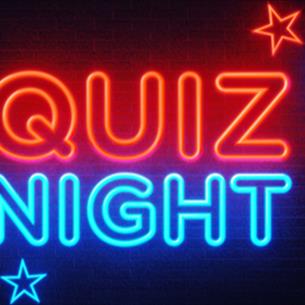 Red and blue neon text which states, 'Quiz Night', with stars around it.