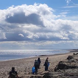 People cleaning up Horden beach.
