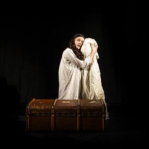 Actress portraying a Victorian woman in despair. 