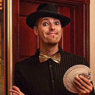 Photo Credit: Paul Knight @ Star Shots
Magician Chris Cross fanning a deck of cards.