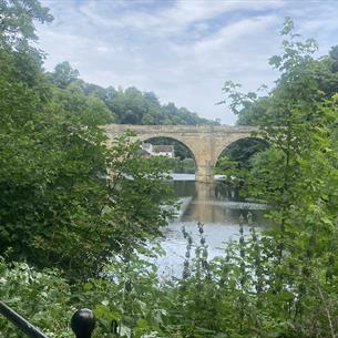 View of the riverbanks towards Prebends Bridge.