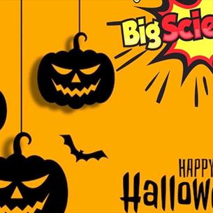 Silhouettes of bats and pumpkins and text which reads, 'Big Science, Happy Halloween.'