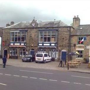 The outside view of historic stone building in the village