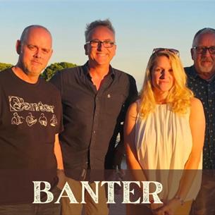 Four people standing on a balcony over the water, with the text 'Banter' underneath them