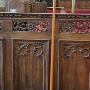 Ornate floral wood carvings in a church.