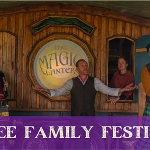 Four folk musicians on the 'Magic Lantern' stage.