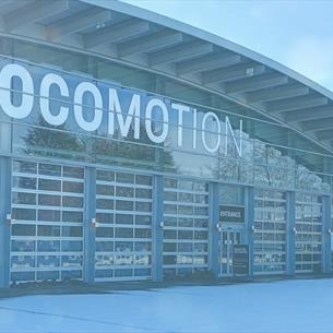 The front of Locomotion Museum covered in snow.