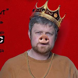 Person with a pig nose wearing a crown, looking sternly against a red background, reviews floating around them