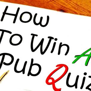 A piece of paper saying 'How to win A pub quiz' with a pen and pencil