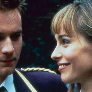 Image from movie. Ewan McGregor looking at Tara Fitzgerald in the film Brassed Off (1996).