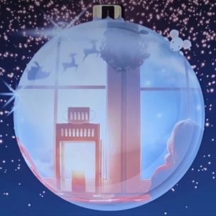 A festive scene inside a Christmas bauble.