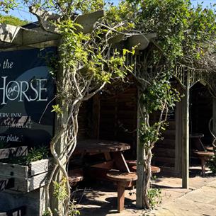 Outdoor, covered picnic area at The Black Horse Beamish