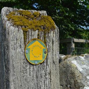 Way mark showing footpath sign