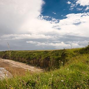 couple walking on the Durham Heritage Coast