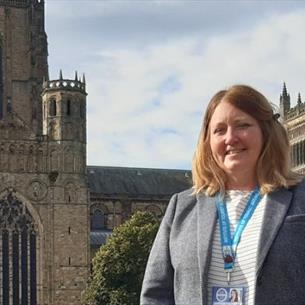 Laura Rhodes in front of Durham Cathedral