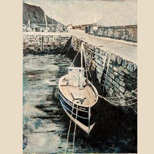 Image by Lavinia Humphries.  Rowing boat moored at harbour.