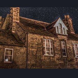 The Lord Crewe Arms at night.