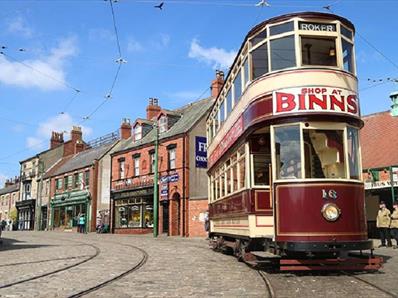1900s Town, Street at Beamish Museum with Tram running through it.