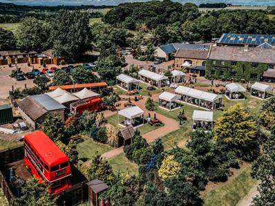 Aerial images showing a bus and buildings