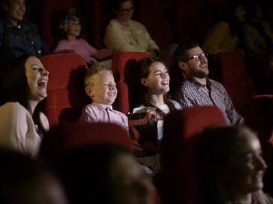 Family watching a movie at Cineworld.