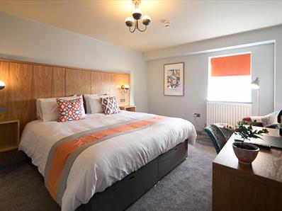 Image of a spacious room with a double bed at The Park Head Hotel.