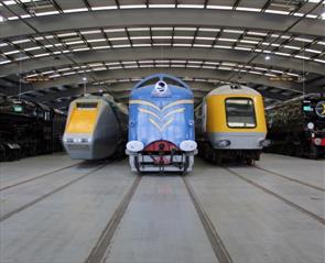 Three trains in a line at Locomotion