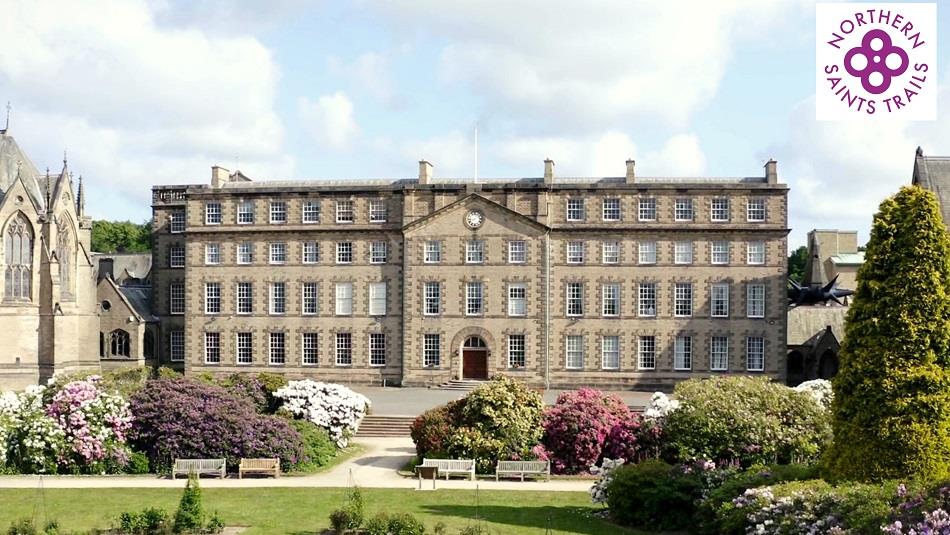 Exterior view of the front of Ushaw with Northern Saints Trails logo