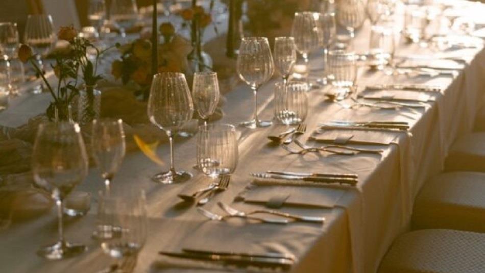 A table beautifully set for a wedding reception.