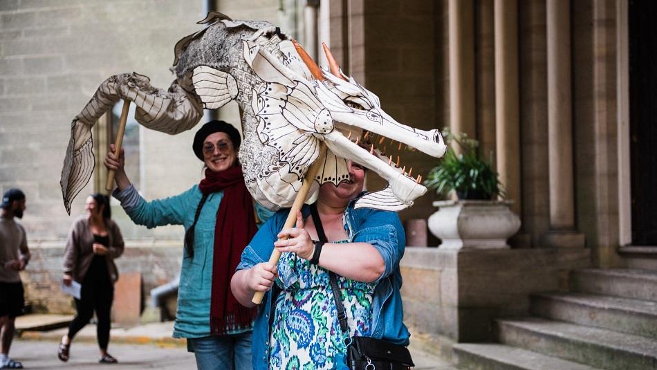 Brancepeth Castle - two women holding up a home made dragon