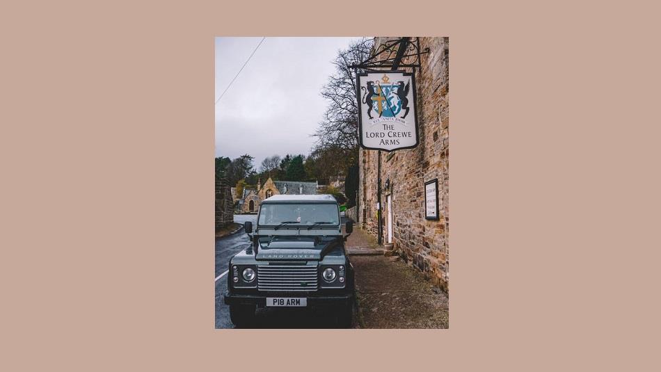 Land Rover parked outside of the Lord Crewe Arms in Blanchland