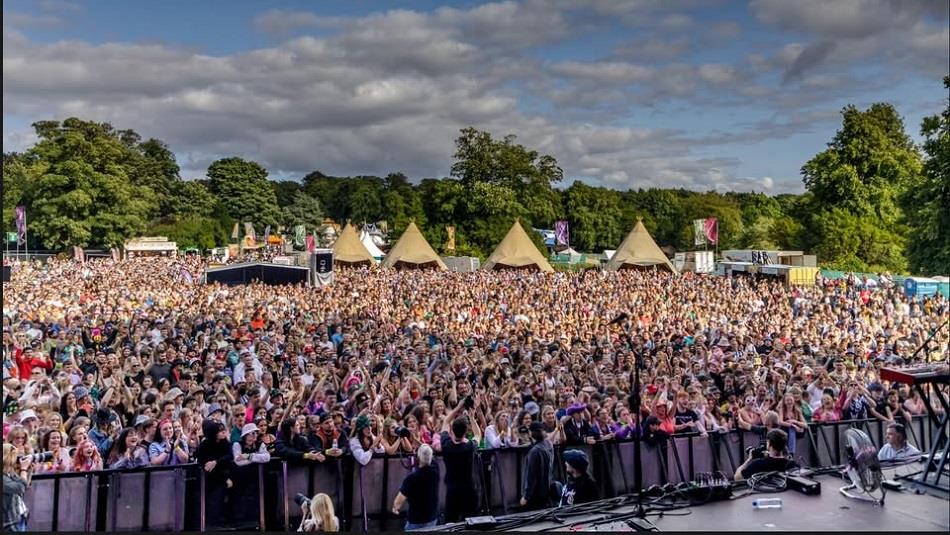 Crowds of people watching a performance at the Hardwick Festival