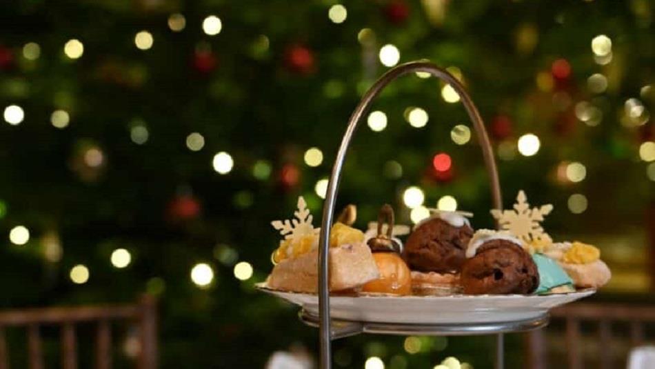 Christmas Afternoon Tea at High Force Hotel. Image of treats and fairy lights.