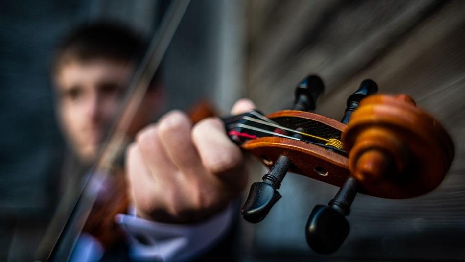 A man playing the violin