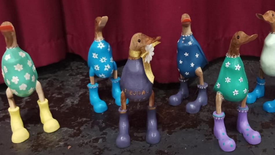 Painted wooden ducks