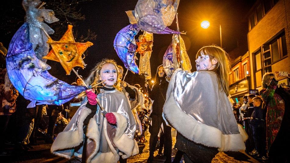 Children taking part in the Winter Light Parade